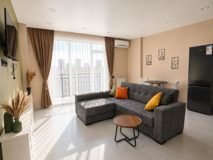 Гостиная с диваном в квартире 51 м² в Батуми ул. Ангиса, 5