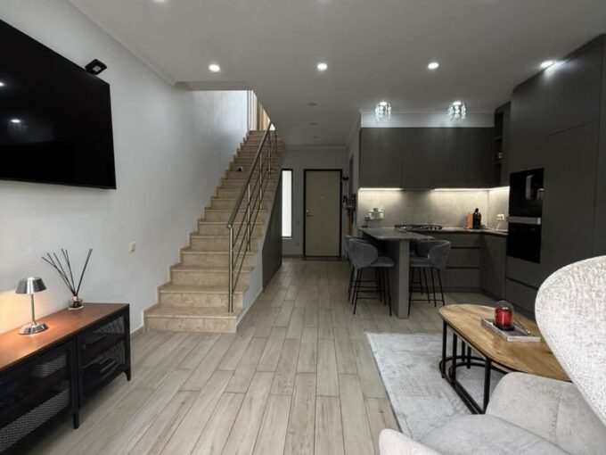 Гостиная в таунхаусе Polo Villas площадью 80 м²